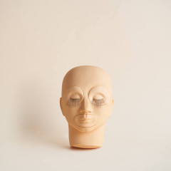 Tête d'entrainement avec étages de cils Tête d'entrainement avec étages de cils